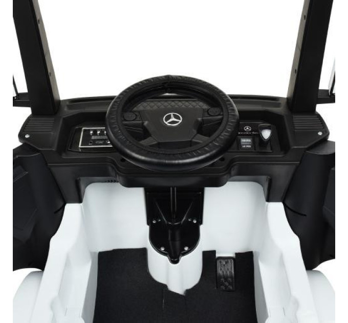 Дитячий електромобіль Мерседес Вантажівка Mercedes M 4208EBLR-1 білий